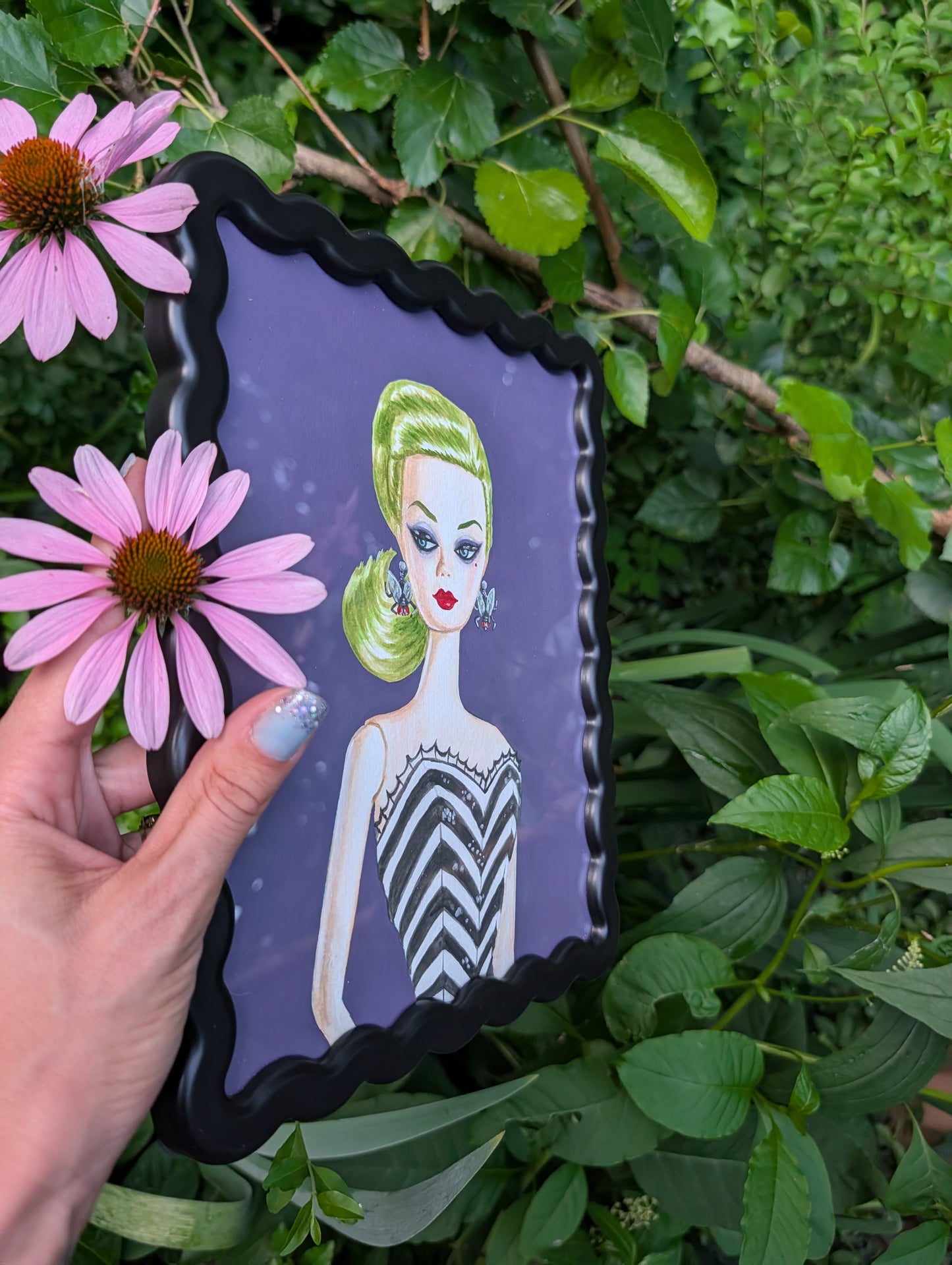 Original mixed media portrait of Barbie dressed as Beetlejuice with green hair spiderweb swimsuit and fly earrings on purple background in black wavy frame