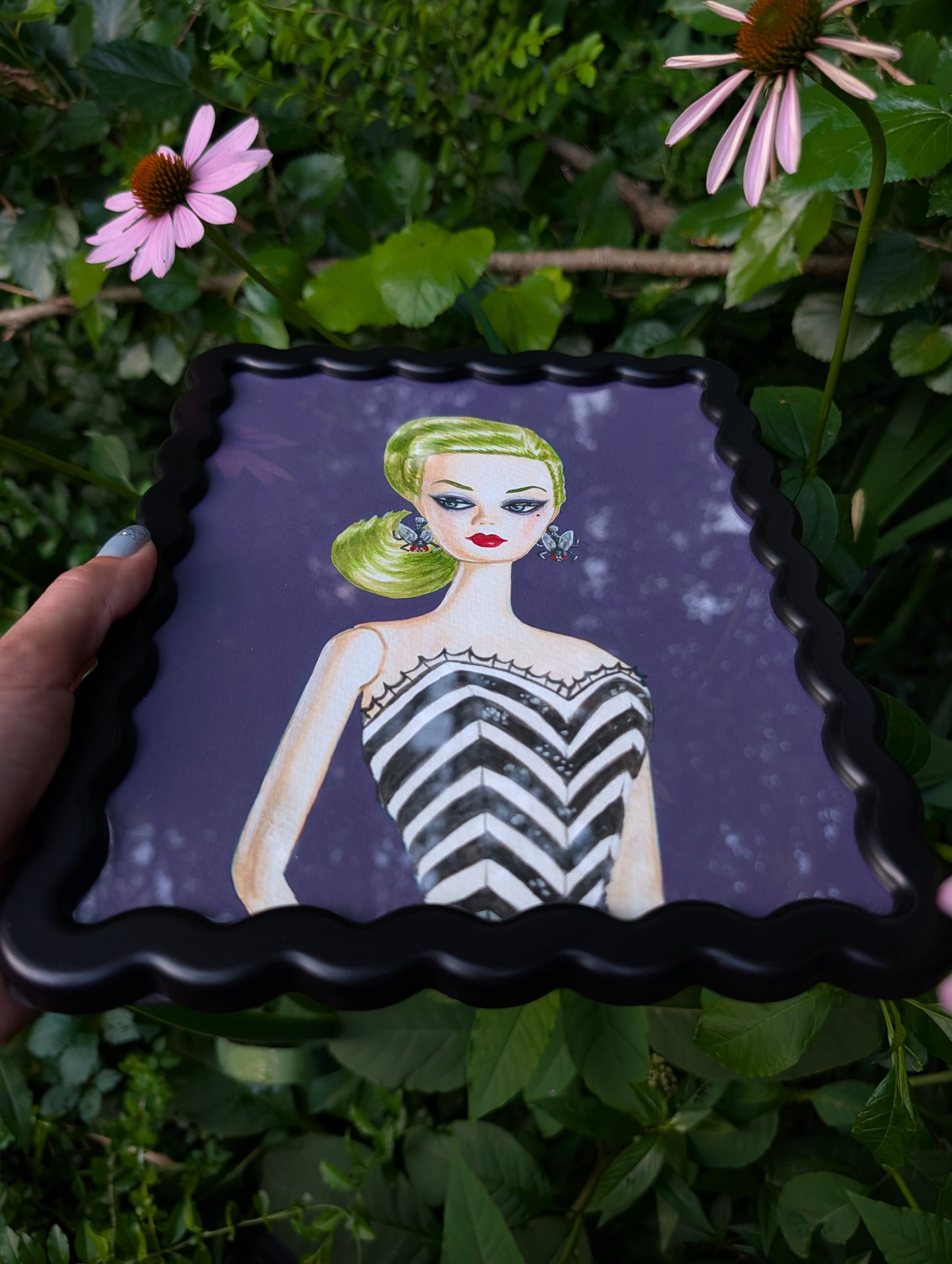 Original mixed media portrait of Barbie dressed as Beetlejuice with green hair spiderweb swimsuit and fly earrings on purple background in black wavy frame