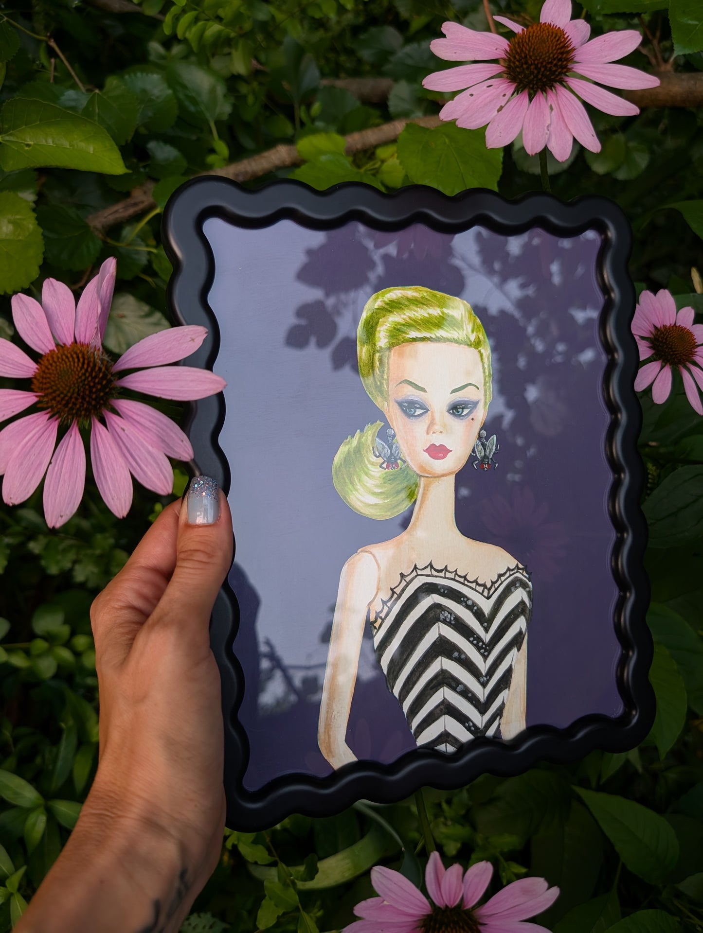Original mixed media portrait of Barbie dressed as Beetlejuice with green hair spiderweb swimsuit and fly earrings on purple background in black wavy frame