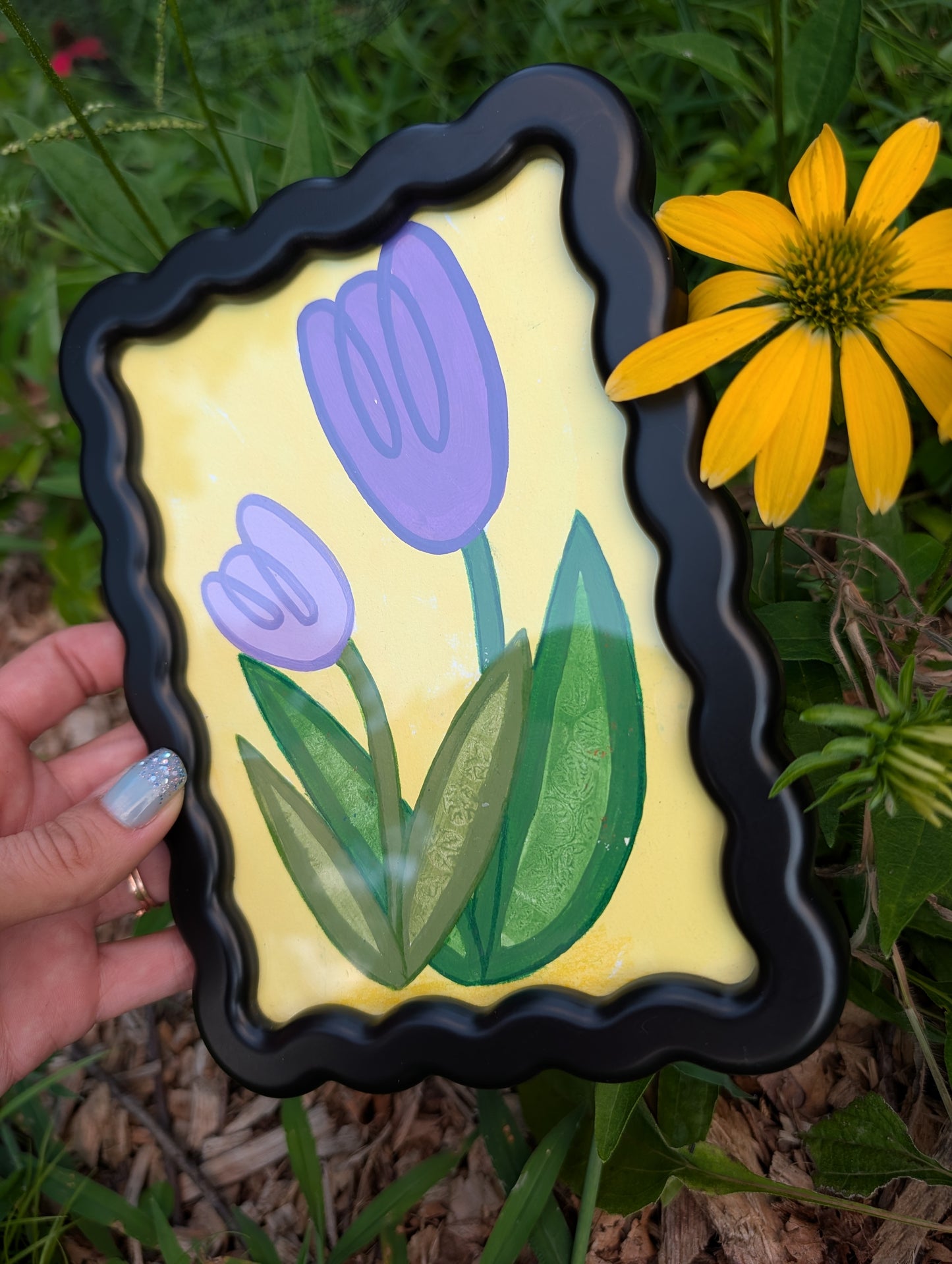 Original acrylic painting of whimsical purple tulips on yellow background in black wavy picture frame