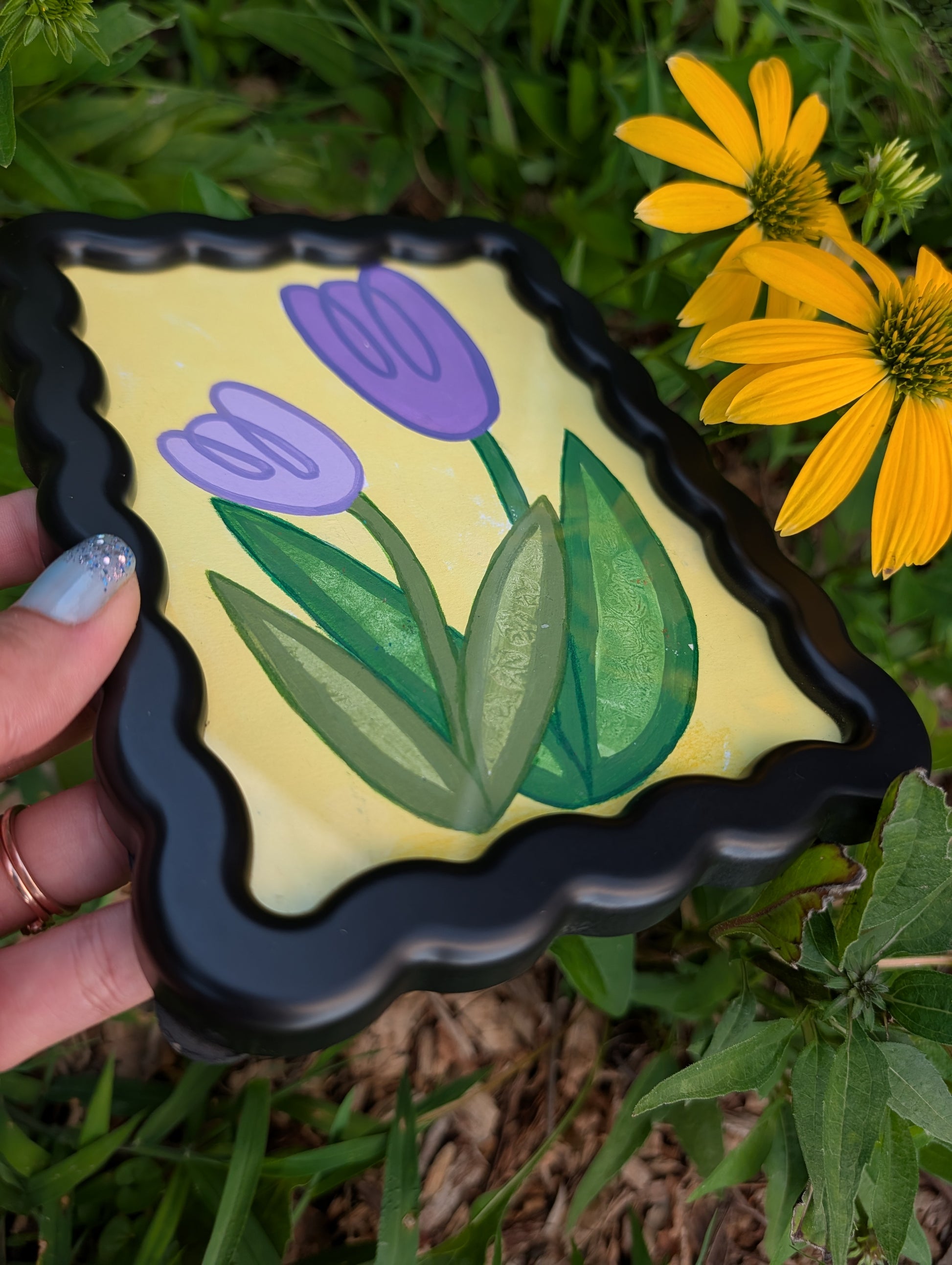 Original acrylic painting of whimsical purple tulips on yellow background in black wavy picture frame
