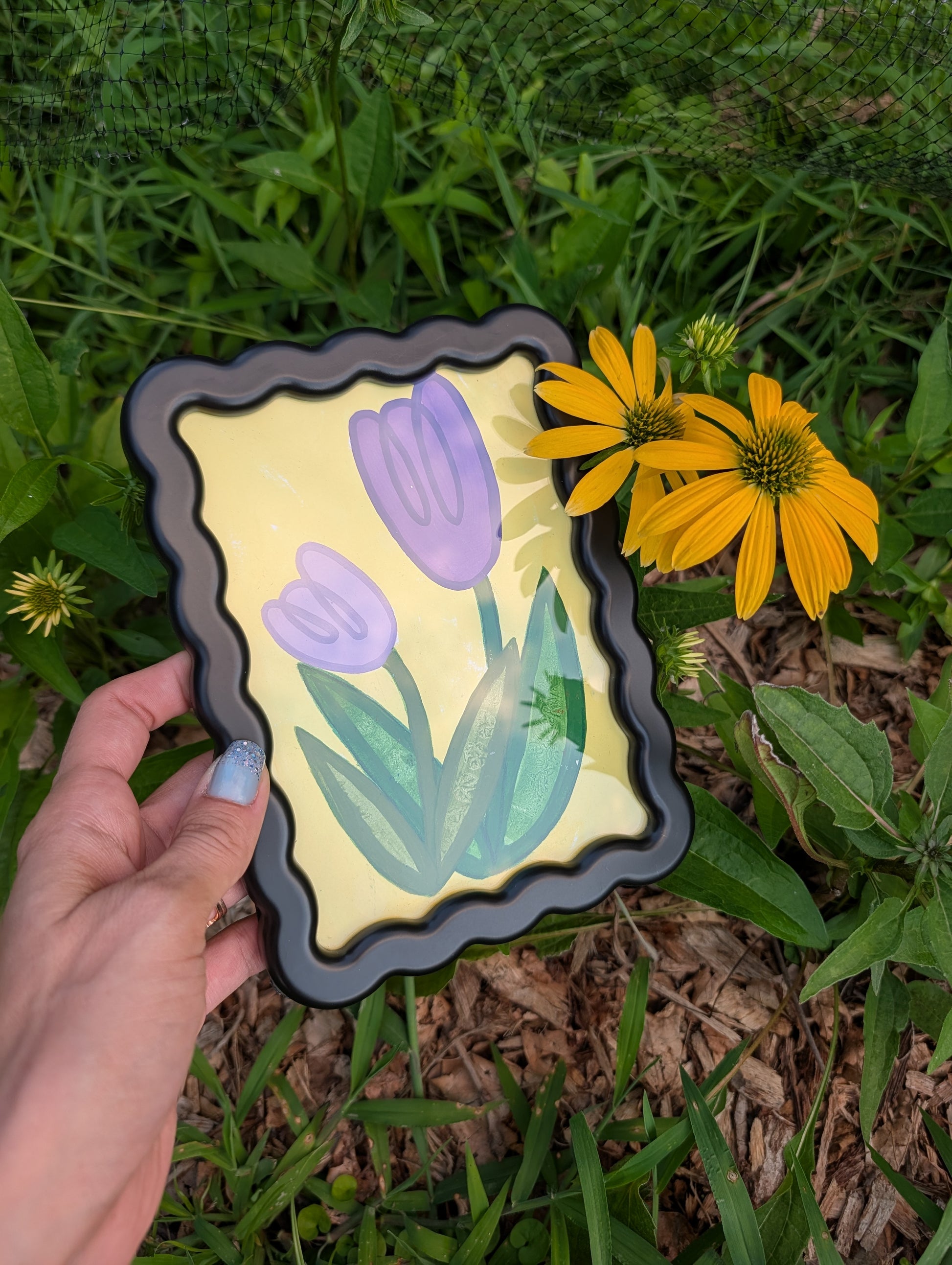 Original acrylic painting of whimsical purple tulips on yellow background in black wavy picture frame