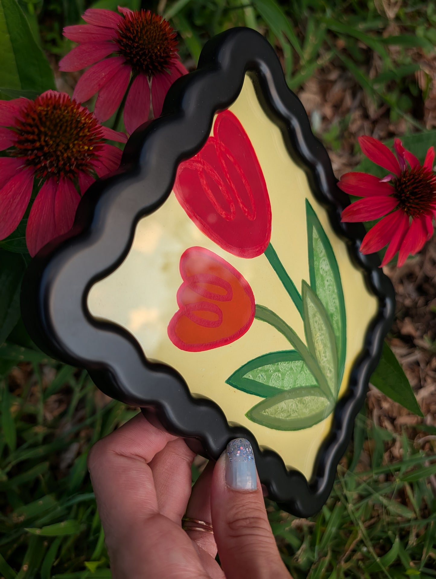 Original acrylic painting of whimsical red tulips on yellow background in black wavy picture frame
