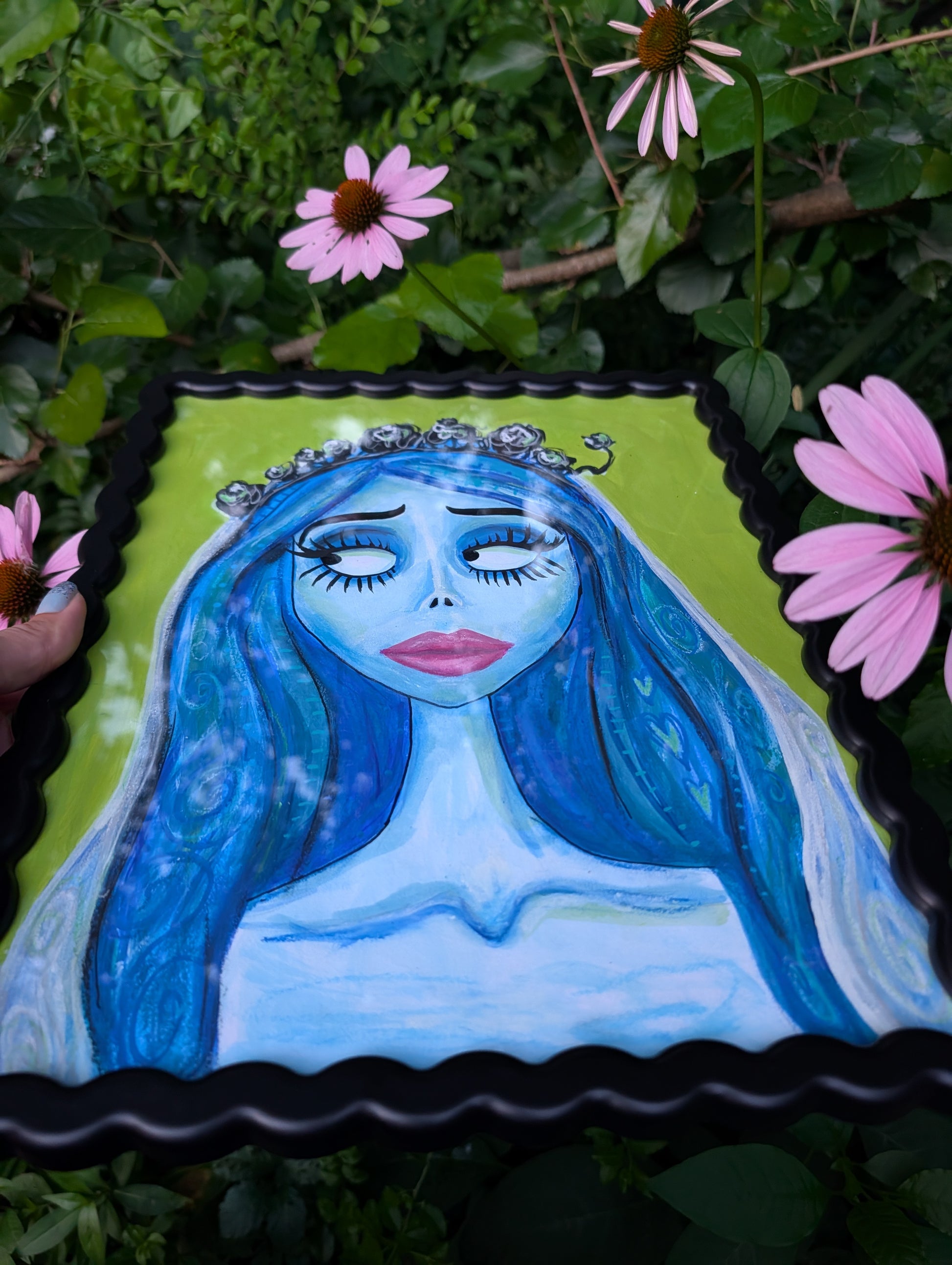 Original mixed media portrait of the Corpse Bride with blue skin and heart details in hair on lime green background in black wavy frame