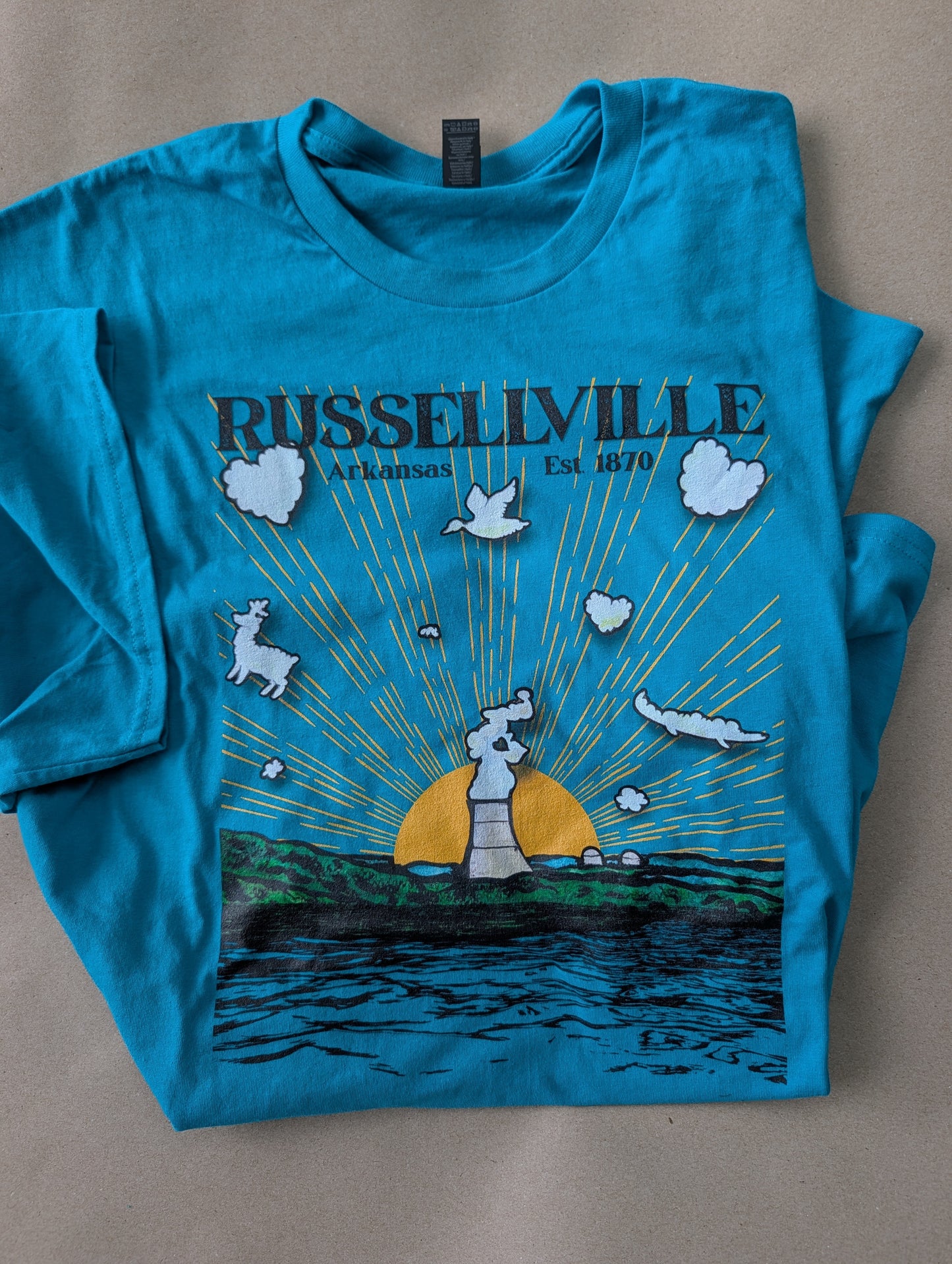 The Cloud Maker — The Adventurer | Russellville Arkansas Unisex Tee