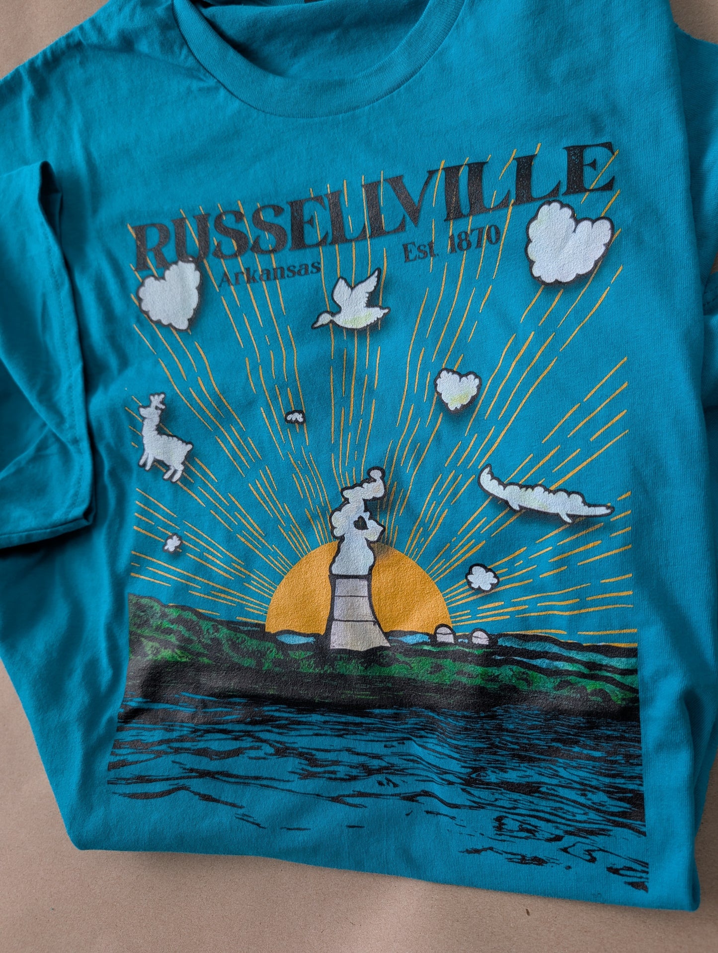 The Cloud Maker — The Adventurer | Russellville Arkansas Unisex Tee